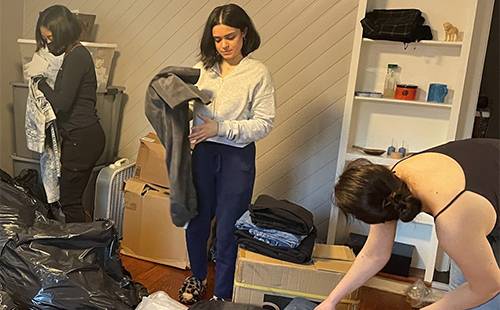 Members of the Climate Action Now Club (Farin Alimo and Noa Nissim Kobliner) can be seen above counting the denim they had collected from their community.